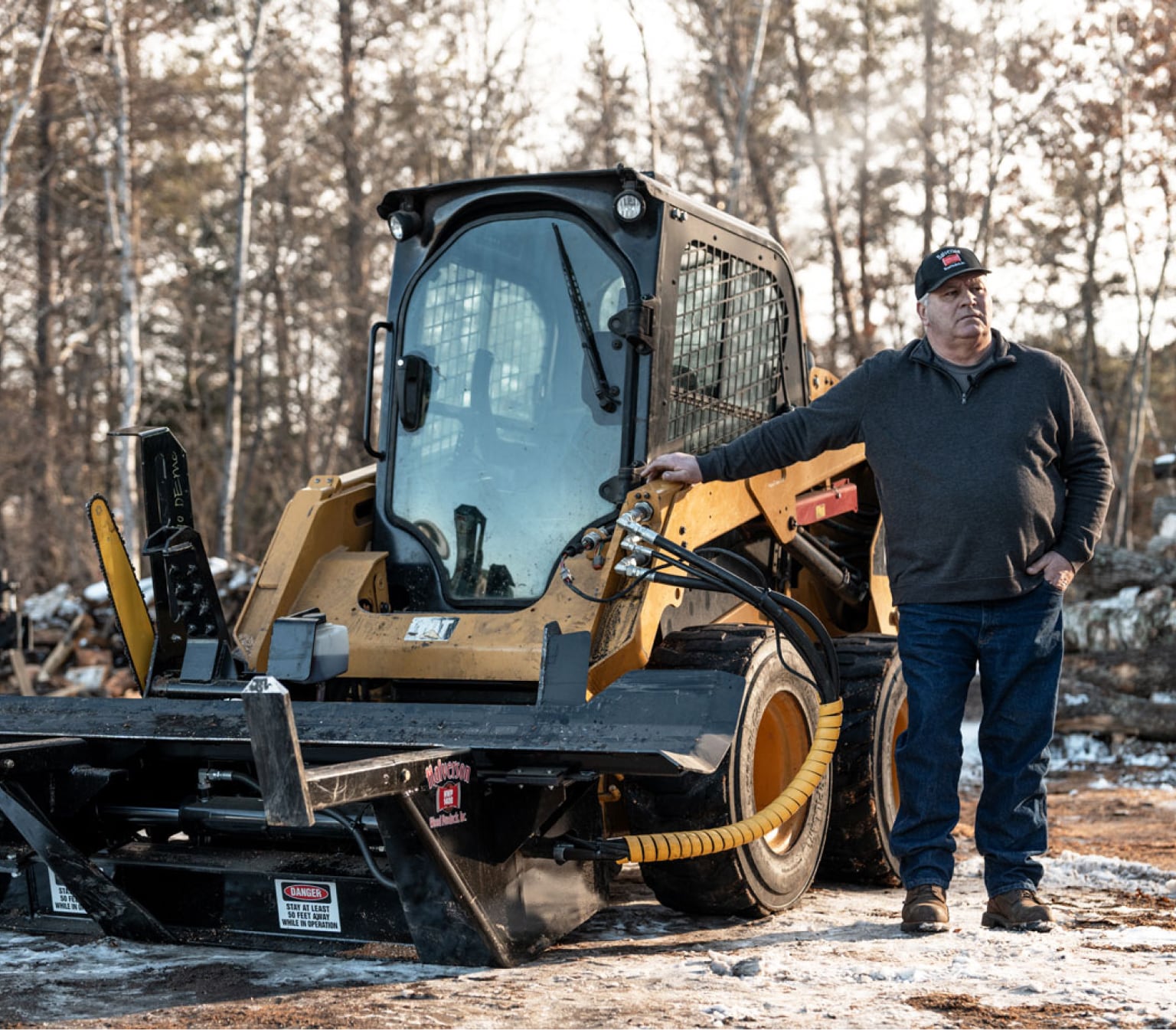 Halverson owner standing next to a processor
