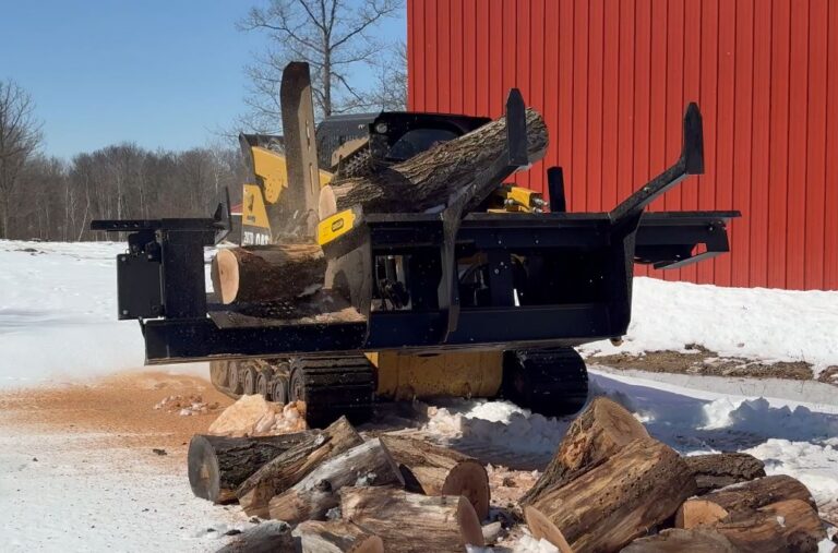 The HWP-165 firewood blocker processing a log.