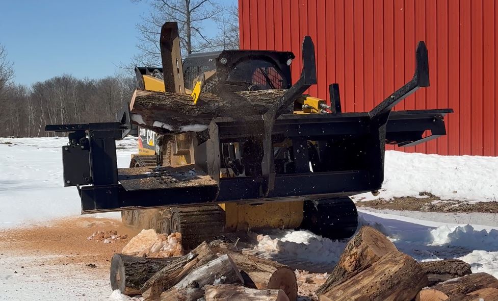 The HWP-165 firewood blocker processing a log.