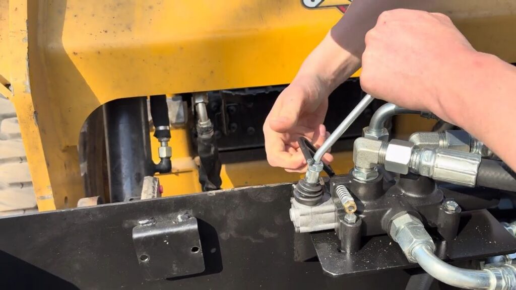 Close-up of a man attaching the HWP-135.