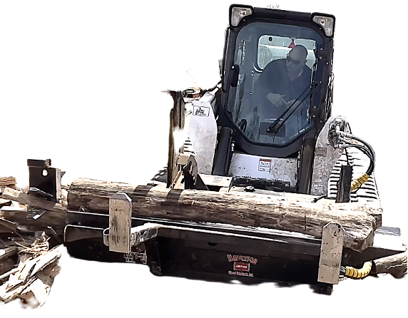 An operator using a Halverson Wood Product firewood processor